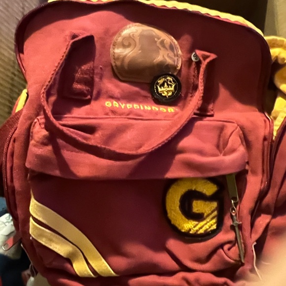 WIZARDING WORLD HARRY POTTER Gryffindor Patch Backpack Maroon Gold
PREOWND🚫holes - Picture 1 of 7